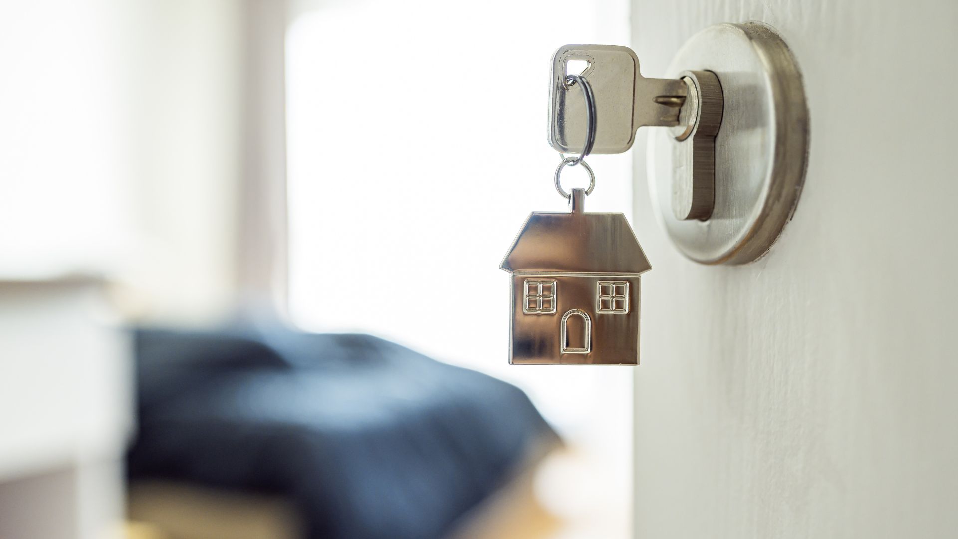 Image showing Key in open door